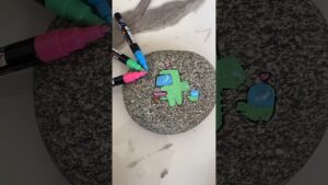 Who’s the impostor among us? #amongus #impostor #gaming #art #posca #rockpainting